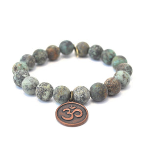 
                  
                    Load image into Gallery viewer, Sunflower Bracelet | African Turquoise Bracelet + Silver Sunflower Charm
                  
                