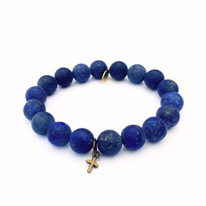 
                  
                    Load image into Gallery viewer, Lapis Lazuli Crystal Bracelet | Matte + Brass Cross Charm
                  
                