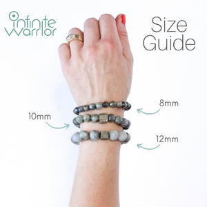 
                  
                    Load image into Gallery viewer, Snowflake Obsidian Crystal Bracelet | Matte + Silver Om
                  
                