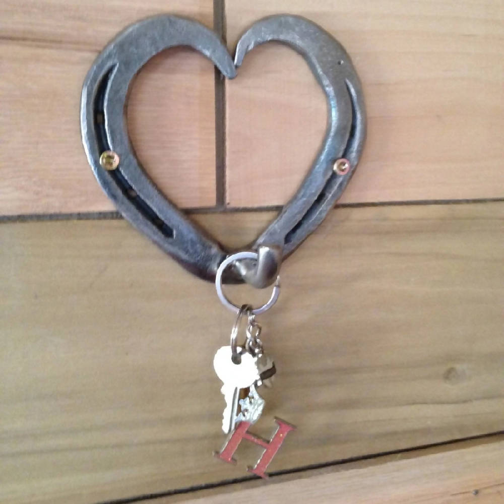 
                  
                    Load image into Gallery viewer, Hand-Forged Horseshoe Heart Hook Hanger - The Heritage Forge
                  
                