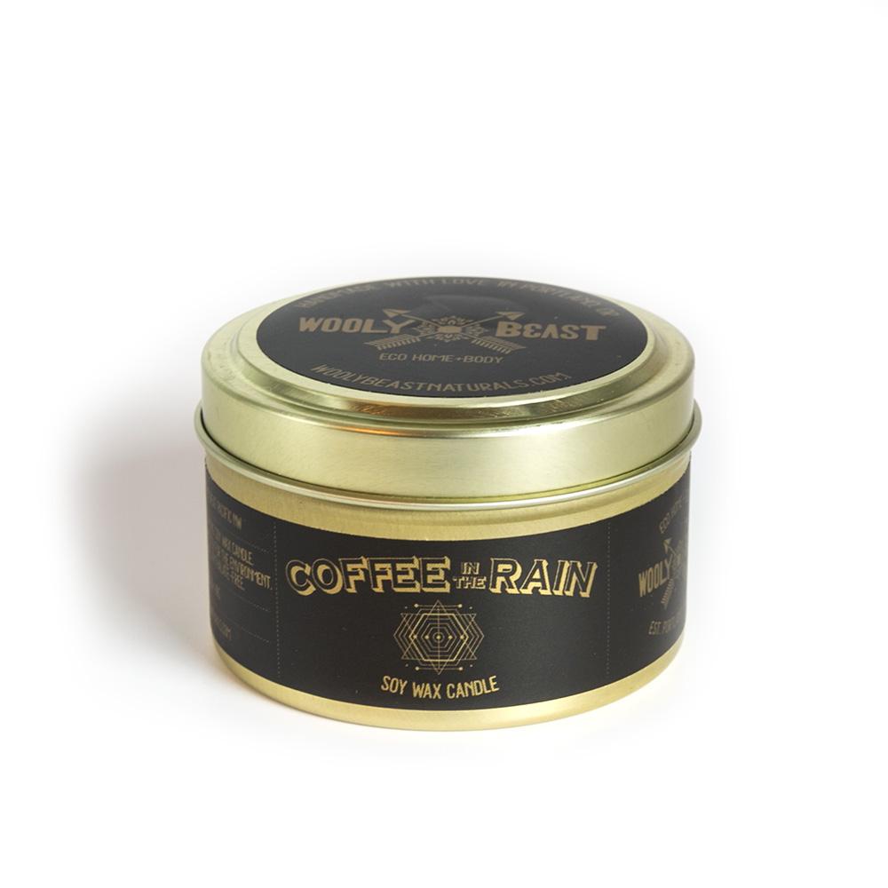 
                  
                    Load image into Gallery viewer, closed coffee in the rain vegan soy candle in gold tin with black and gold label with geometric design on white background
                  
                