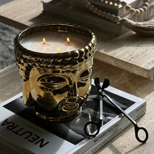 
                  
                    Load image into Gallery viewer, gold-ceramic-buddha-head-candle-with-3-cotton-wicks-soy-wax
                  
                