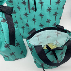 
                  
                    Load image into Gallery viewer, Palm Tree Reusable Cloth Gift Bags - Set of 5
                  
                