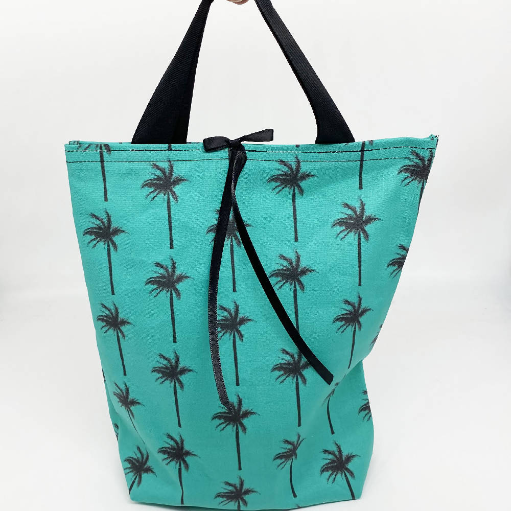 
                  
                    Load image into Gallery viewer, Palm Tree Reusable Cloth Gift Bags - Set of 5
                  
                